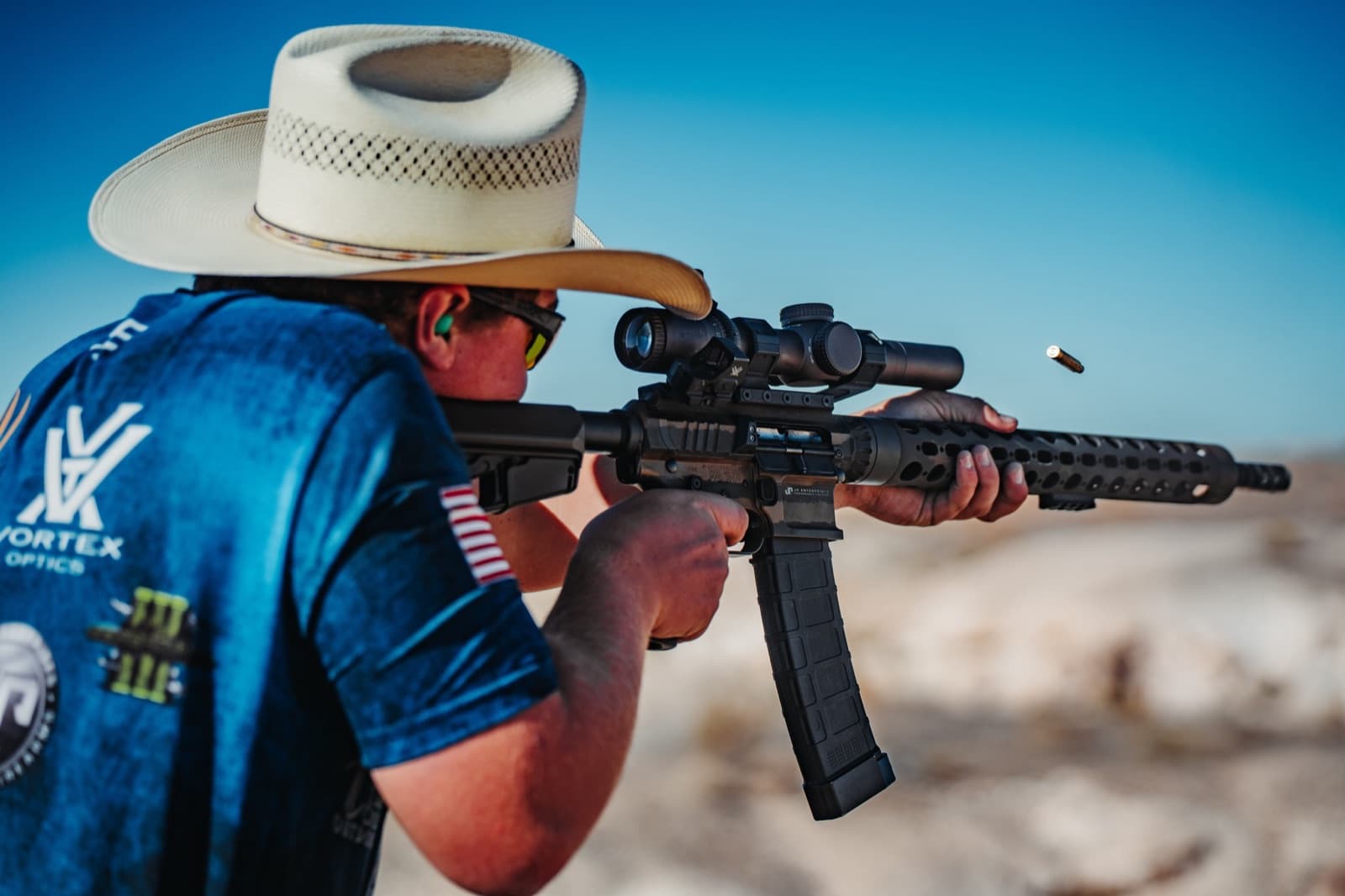 Competitor firing a JP rifle at the range