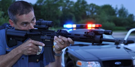 Law enforcement officer with a JP rifle